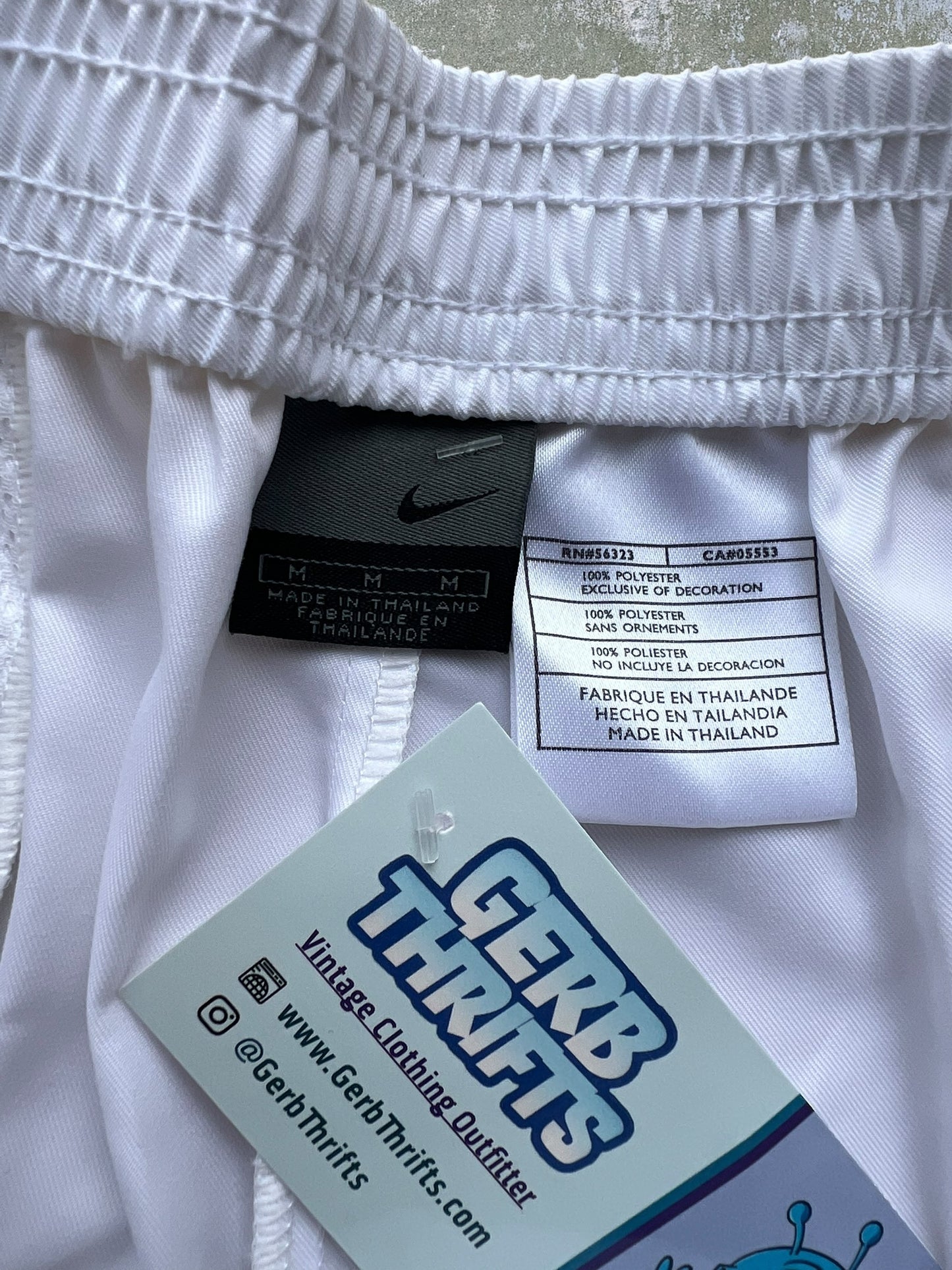 Early-2000s Nike Challenge Court Shorts (M)