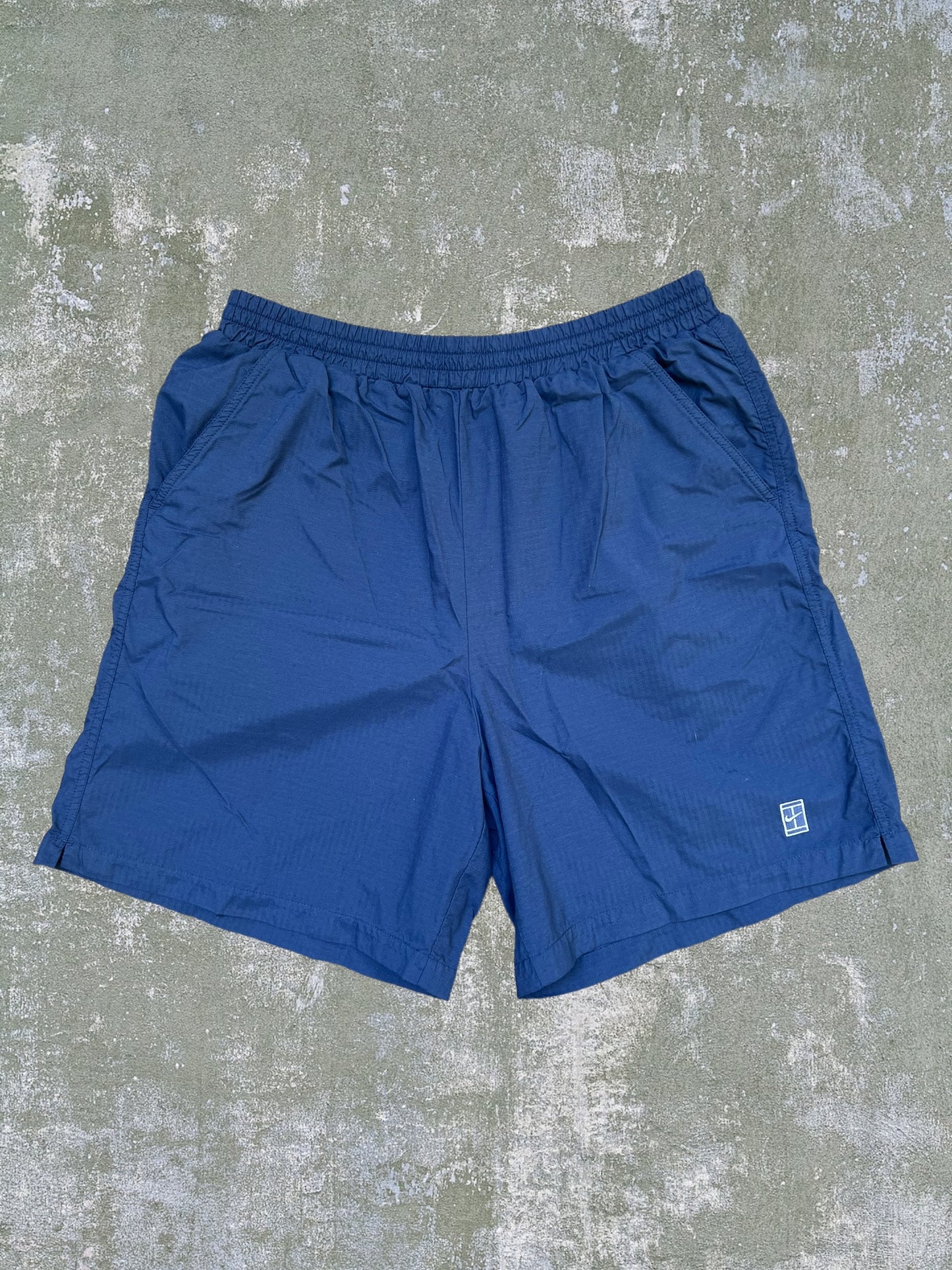 Early-2000s Nike Challenge Court Shorts (L)