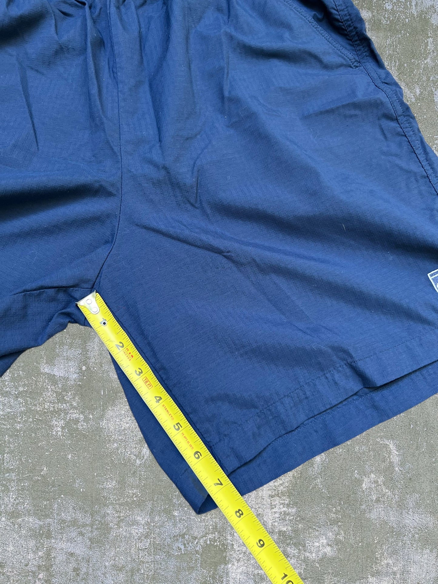 Early-2000s Nike Challenge Court Shorts (L)