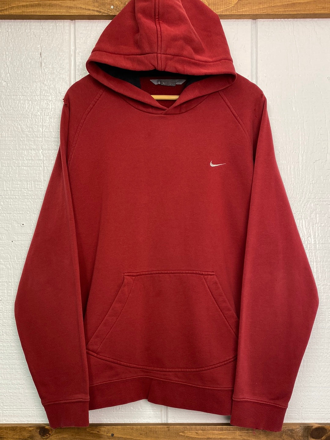 Nike pocket best sale swoosh hoodie